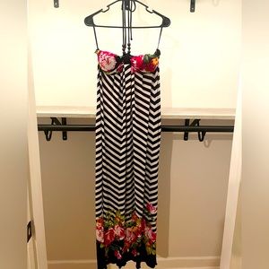 Floral Dress. Has straps that go around neck.